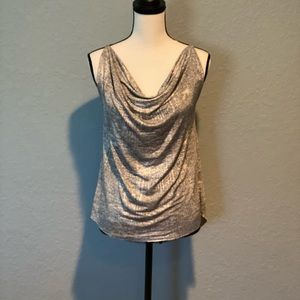 Sheer top with leather like accent on back